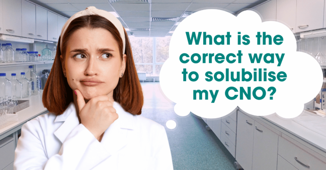 Female scientist in lab thinking, with thought bubble: ‘What is the correct way to solubilise my CNO?’